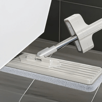 nettoyer sous meuble balai laver le sol