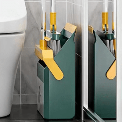 balayette et pelle vert ranger discrĂštement ne prend pas place