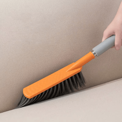 nettoyage canapé balayette orange