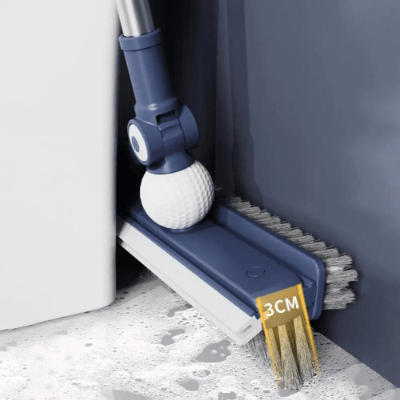 nettoyage derriĂšre toilette avec balais brosse bleu