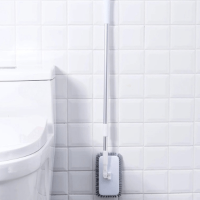 suspendre balai brosse pour sol au mur