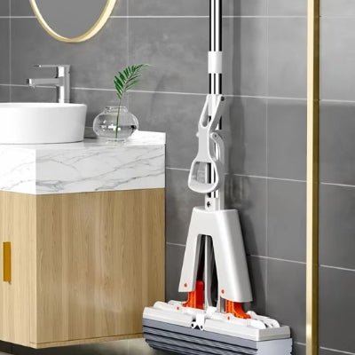 accrocher balai éponge au mur salle de bain