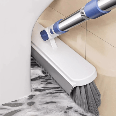 nettoie derrière toilette avec balai brosse carrelage