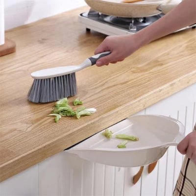 nettoie salete cuisine plan de travail balayette et pelle