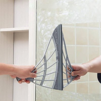 nettoyer miroir avec balais magiques gris