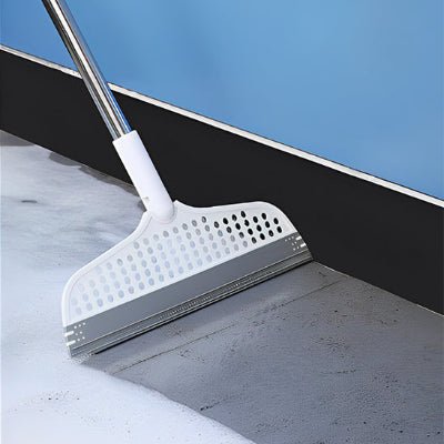 racler sol avec balais magique